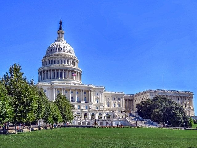 A picture of a capital building within the United States.